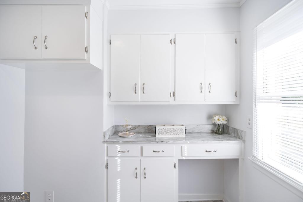 433 Pinecrest Road Macon, GA 31204 - Photo 16 of 38 a view of cabinets with wooden floor
