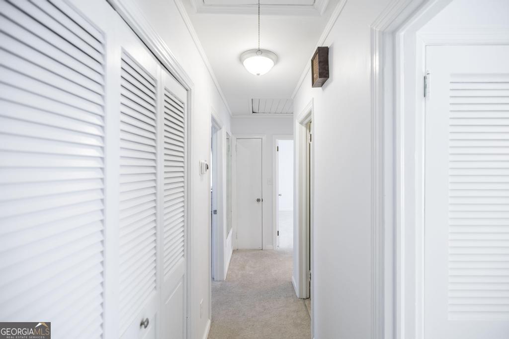 433 Pinecrest Road Macon, GA 31204 - Photo 19 of 38 a view of a hallway with a white door