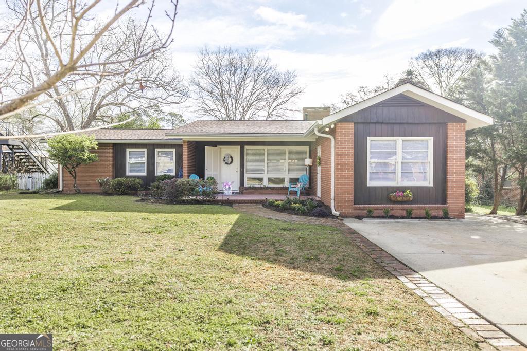 433 Pinecrest Road Macon, GA 31204 - Photo 2 of 38 a view of a house with backyard and sitting area