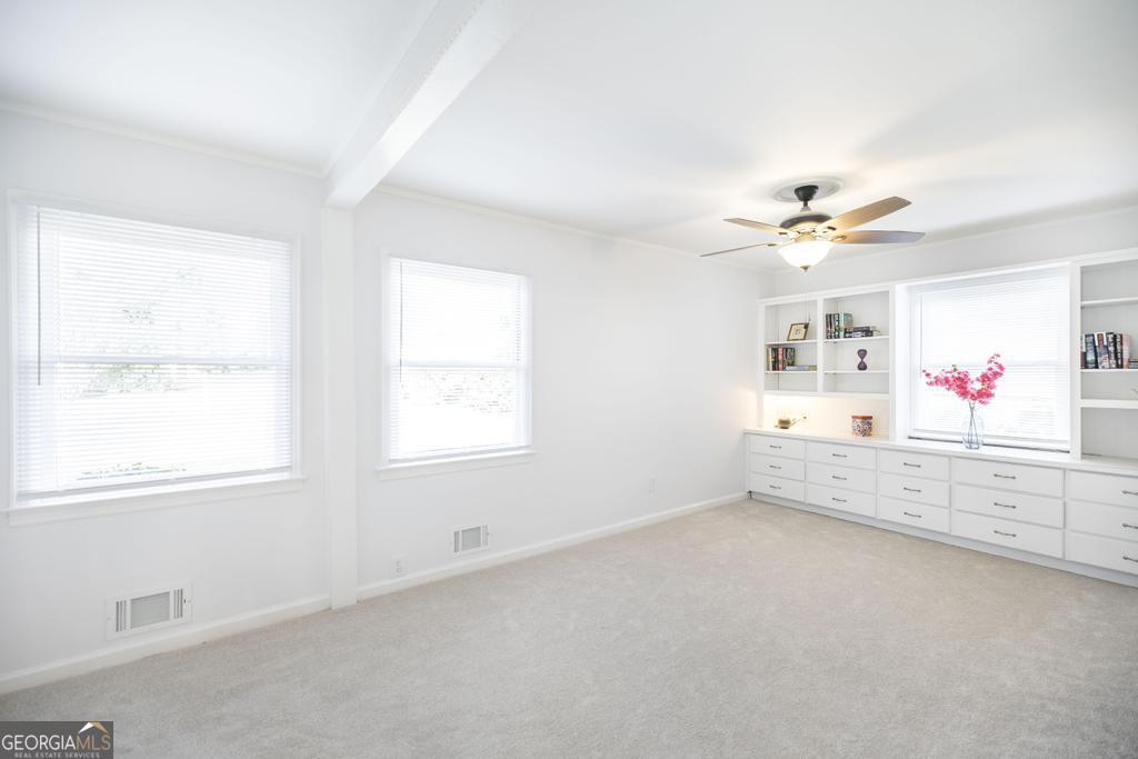 433 Pinecrest Road Macon, GA 31204 - Photo 21 of 38 an empty room with windows and cabinet