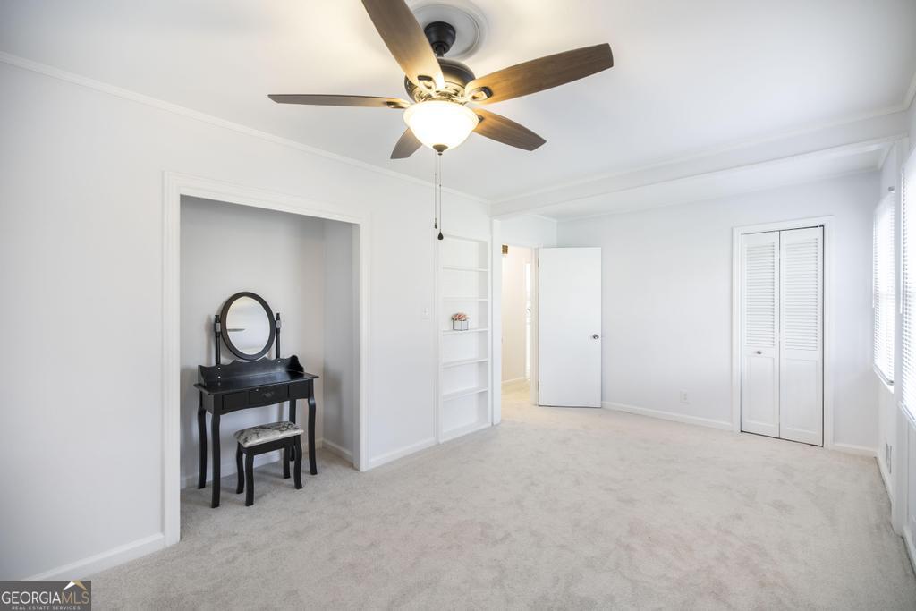 433 Pinecrest Road Macon, GA 31204 - Photo 23 of 38 a view of an empty room with a fan