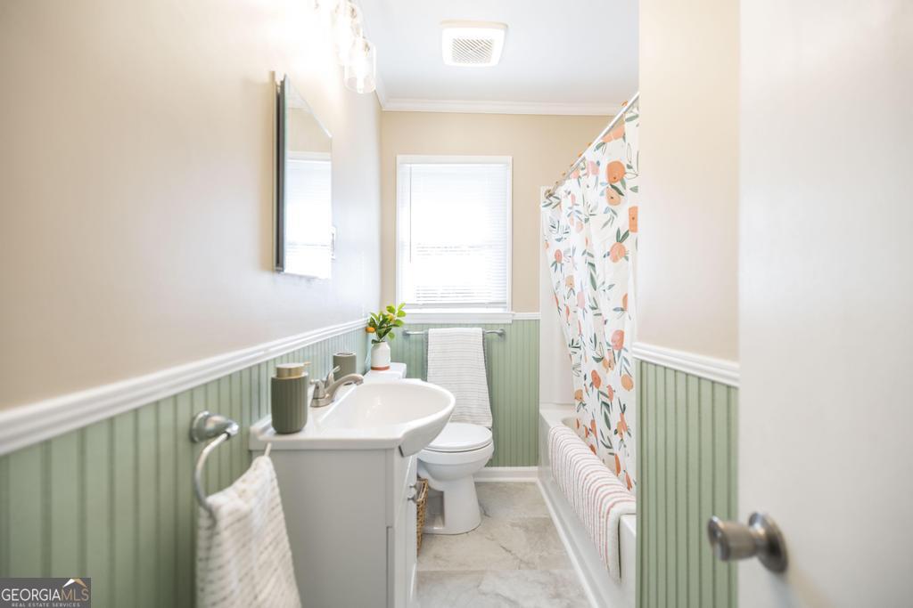 433 Pinecrest Road Macon, GA 31204 - Photo 24 of 38 a bathroom with a sink a toilet and shower