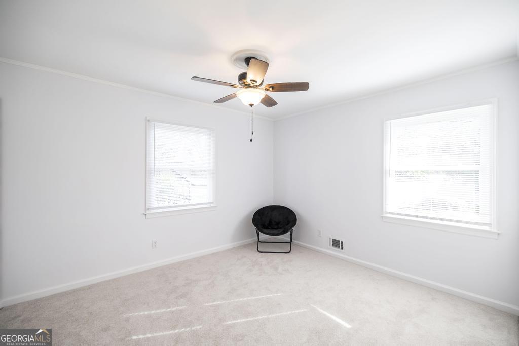 433 Pinecrest Road Macon, GA 31204 - Photo 25 of 38 a living room with furniture and a window