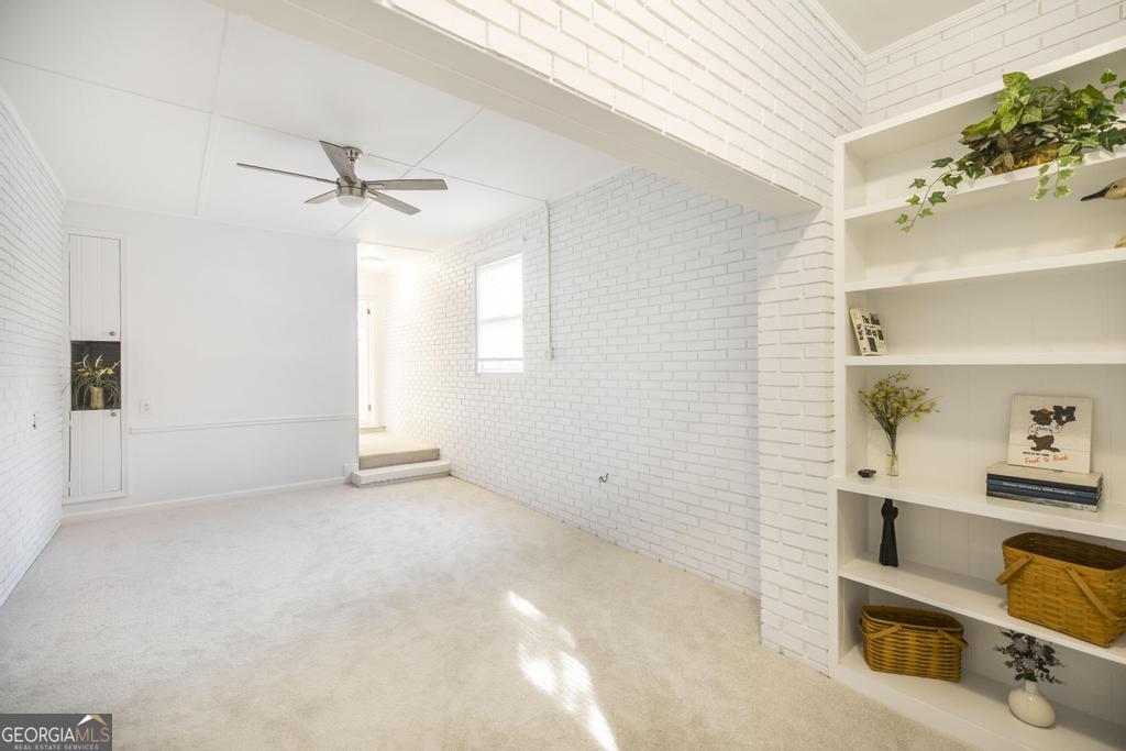 433 Pinecrest Road Macon, GA 31204 - Photo 29 of 38 a view of room with cabinet and window