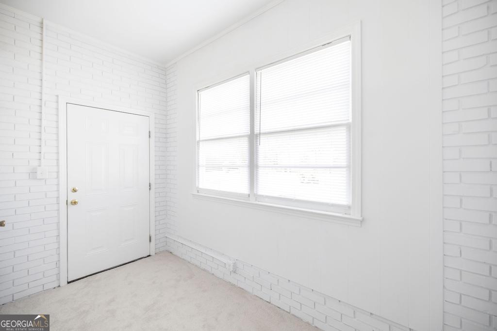 433 Pinecrest Road Macon, GA 31204 - Photo 30 of 38 an empty room with a window