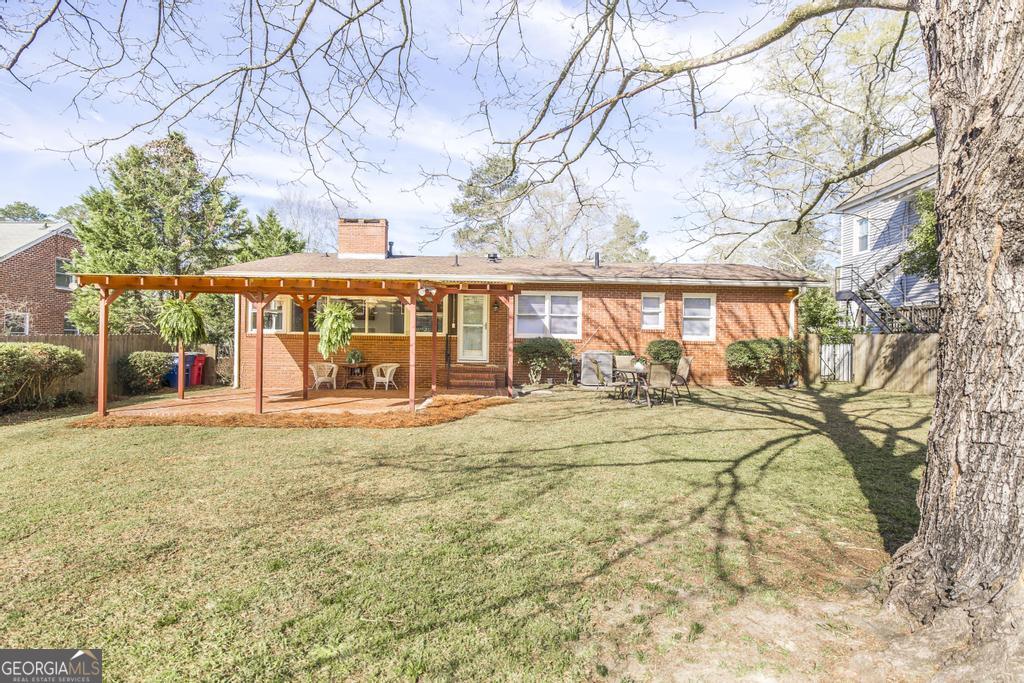 433 Pinecrest Road Macon, GA 31204 - Photo 33 of 38 front view of a house with a large trees