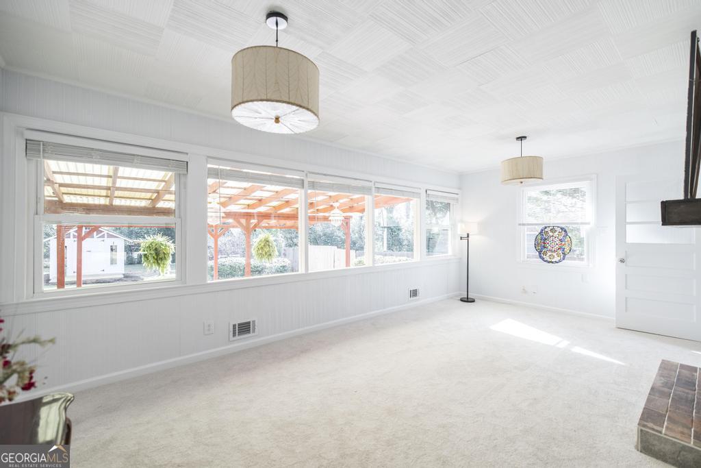 433 Pinecrest Road Macon, GA 31204 - Photo 9 of 38 a view of an empty room with a window