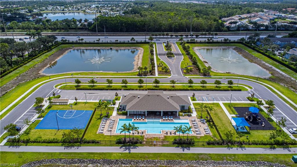 15172 Wildflower Circle Naples, FL 34119 - Photo 12 of 16 an aerial view of swimming pool