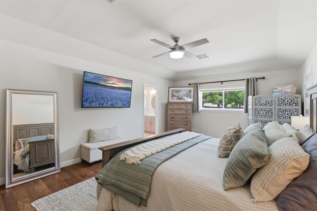 10390 Ridgecrest Street Frisco, TX 75033 - Photo 23 of 40 a bedroom with a bed and a window