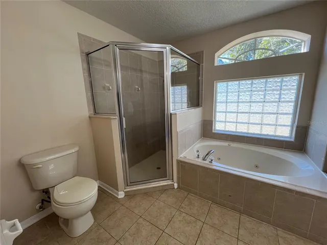 a kitchen with wooden floors and kitchen view