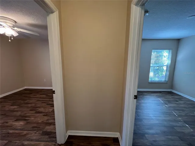 a view of a livingroom with wooden floor