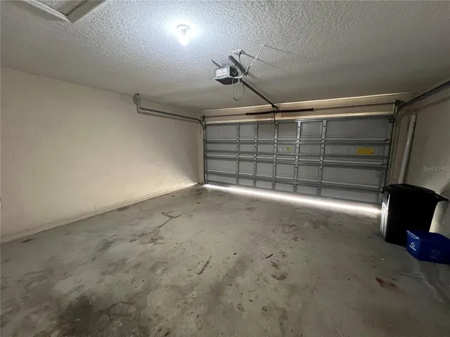 a view of a field with lots of trees