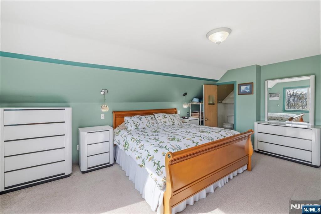 119 Overpeck Avenue Ridgefield Park, NJ 07660 - Photo 26 of 44 a bedroom with a bed and furniture