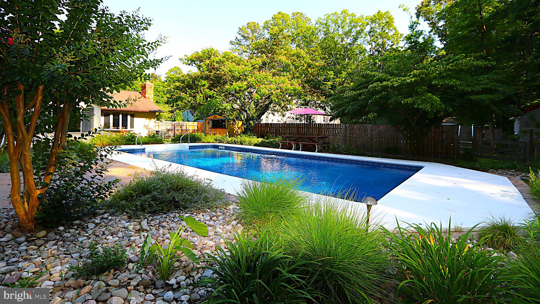 342 Wicomico Road Stevensville, MD 21666 - Photo 8 of 61 Tranquil oasis with sparkling pool.