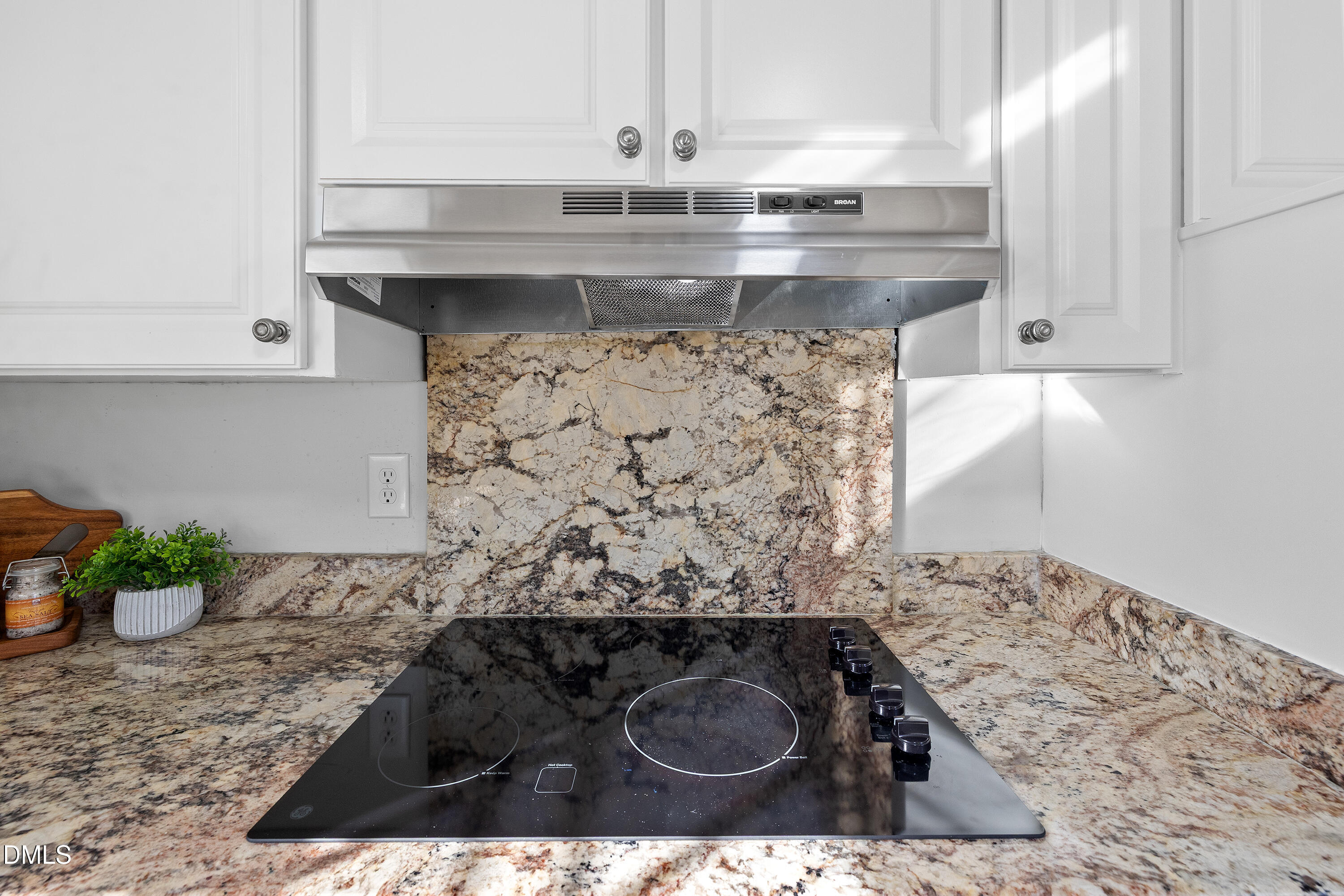 4601 Pemberton Drive Raleigh, NC 27609 - Photo 21 of 44 a kitchen with a stove
