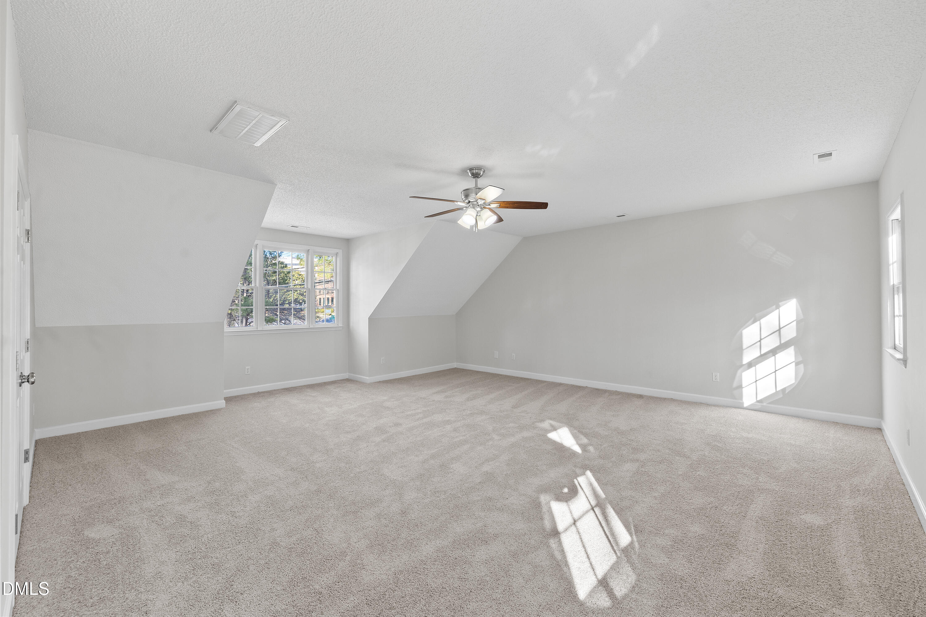 4601 Pemberton Drive Raleigh, NC 27609 - Photo 31 of 44 a view of an empty room with a window