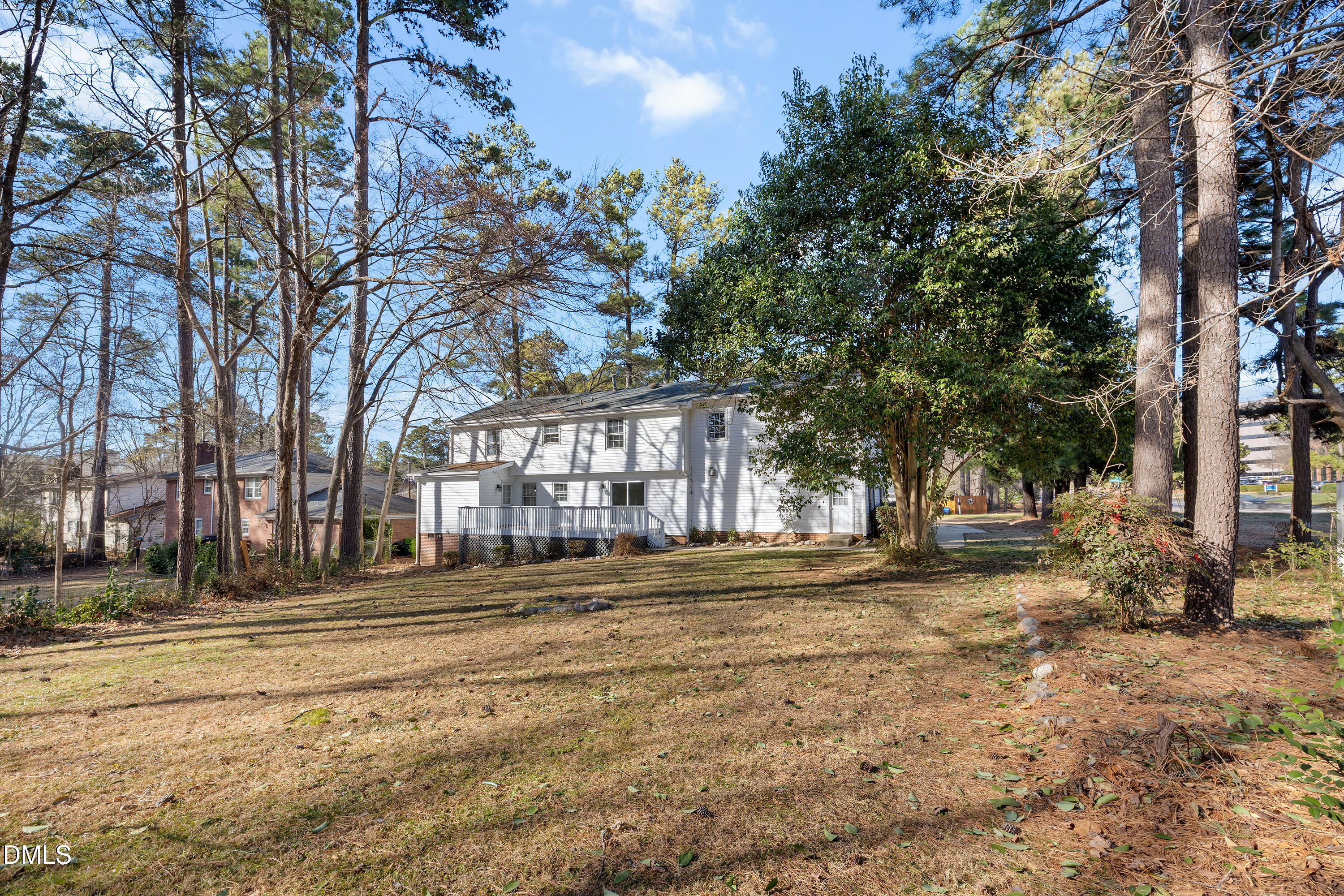 4601 Pemberton Drive Raleigh, NC 27609 - Photo 41 of 44 a front view of a building with trees
