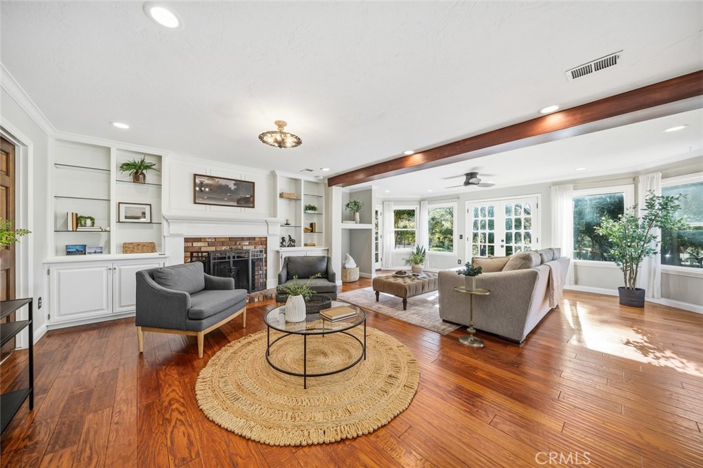 12250 San Antonio Road Atascadero, CA 93422 - Photo 2 of 46 a living room with fireplace furniture and a large window