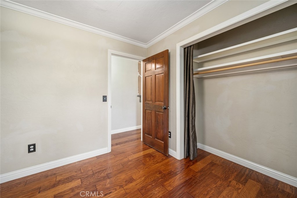 12250 San Antonio Road Atascadero, CA 93422 - Photo 33 of 46 a view of an empty room with wooden floor and a window