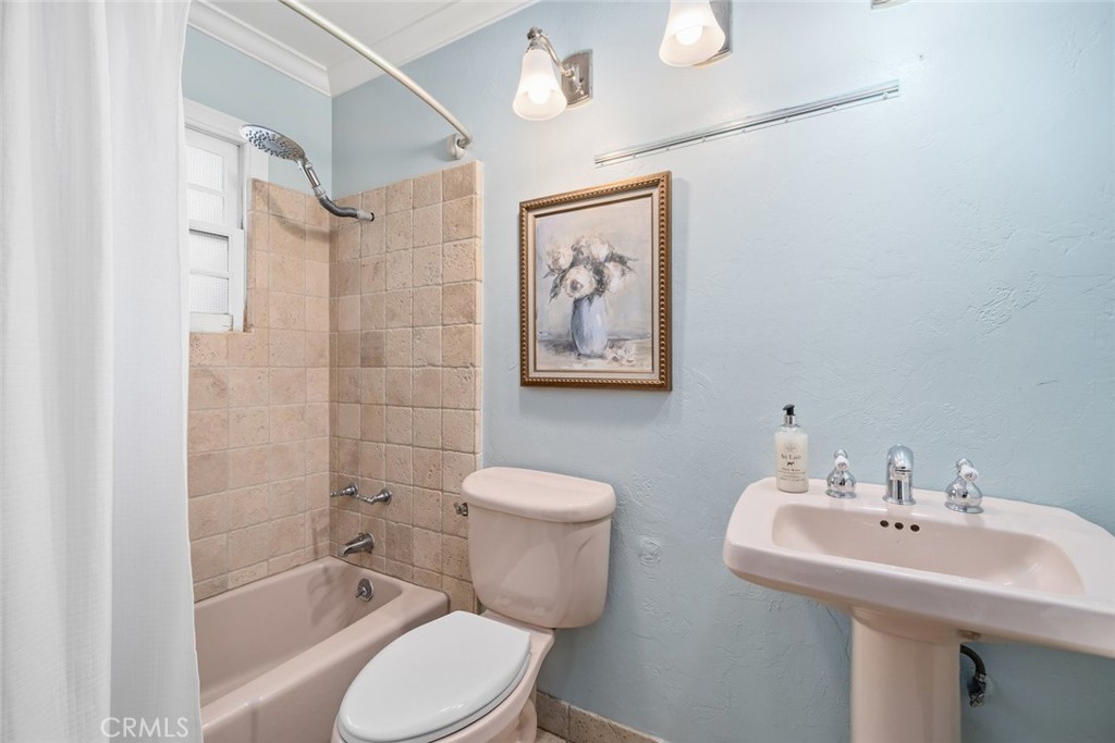 12250 San Antonio Road Atascadero, CA 93422 - Photo 34 of 46 a bathroom with a toilet sink and shower