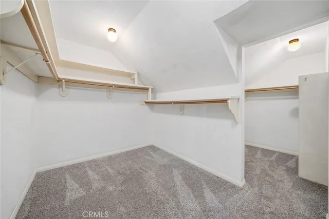 a view of an empty walk in closet