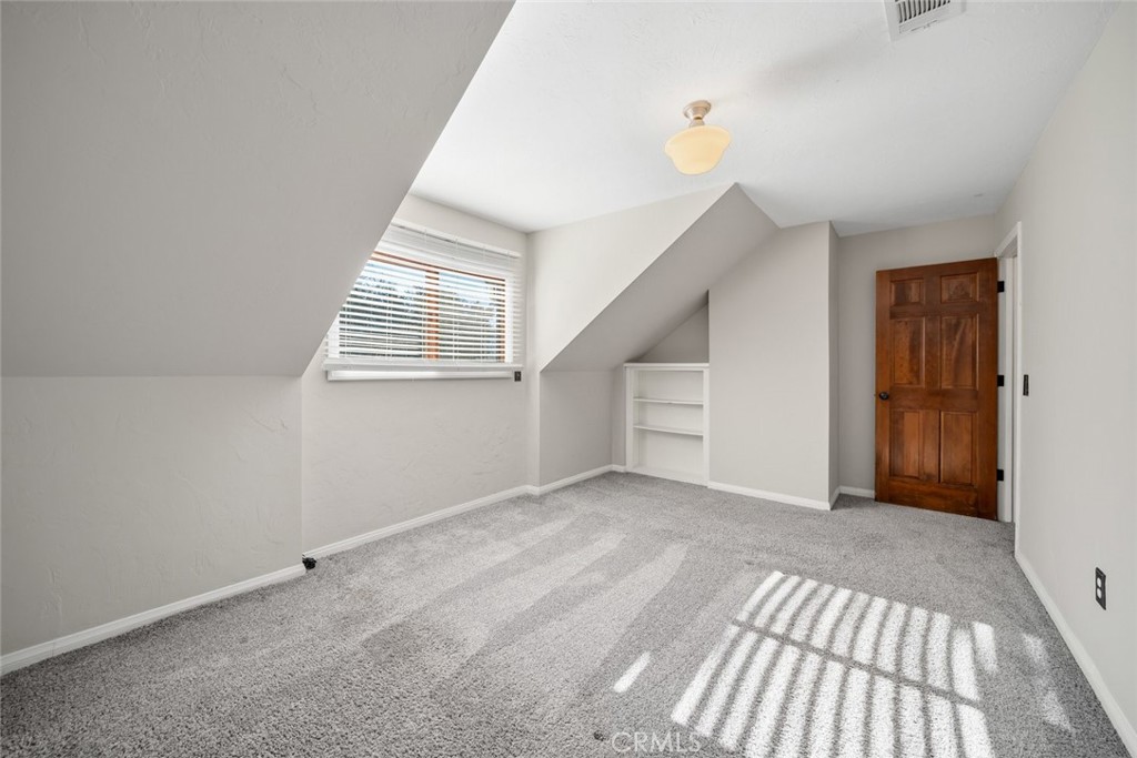 12250 San Antonio Road Atascadero, CA 93422 - Photo 43 of 46 a view of an empty room with stairs and a window