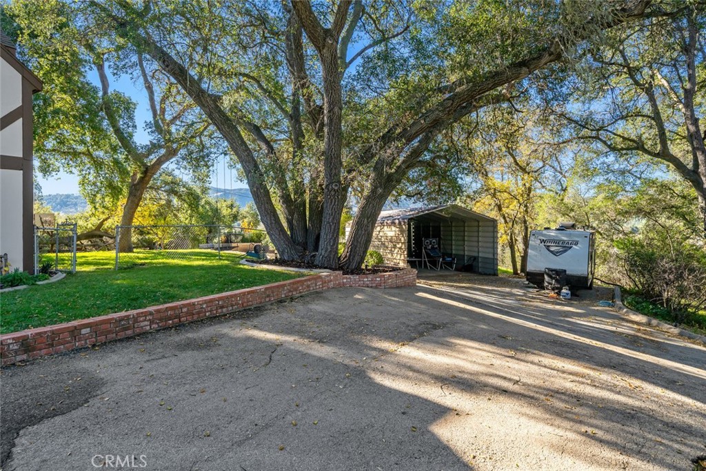 12250 San Antonio Road Atascadero, CA 93422 - Photo 46 of 46 a view of a house with a yard and large tree