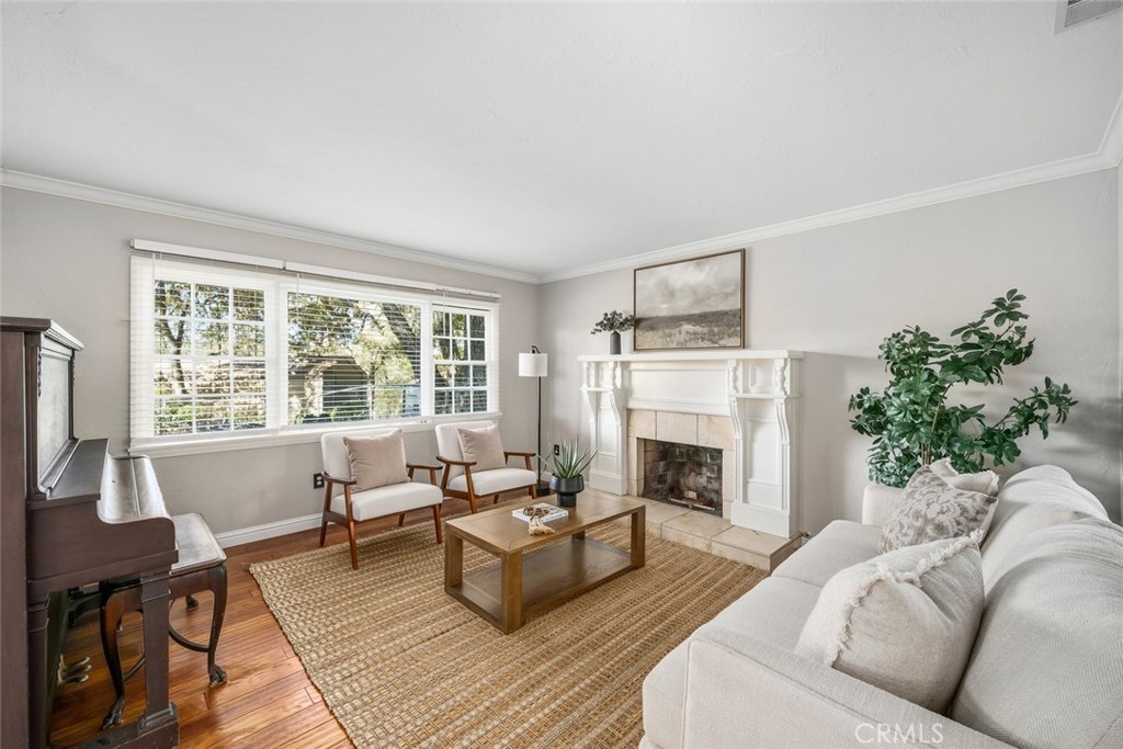 12250 San Antonio Road Atascadero, CA 93422 - Photo 8 of 46 a living room with furniture and a fireplace