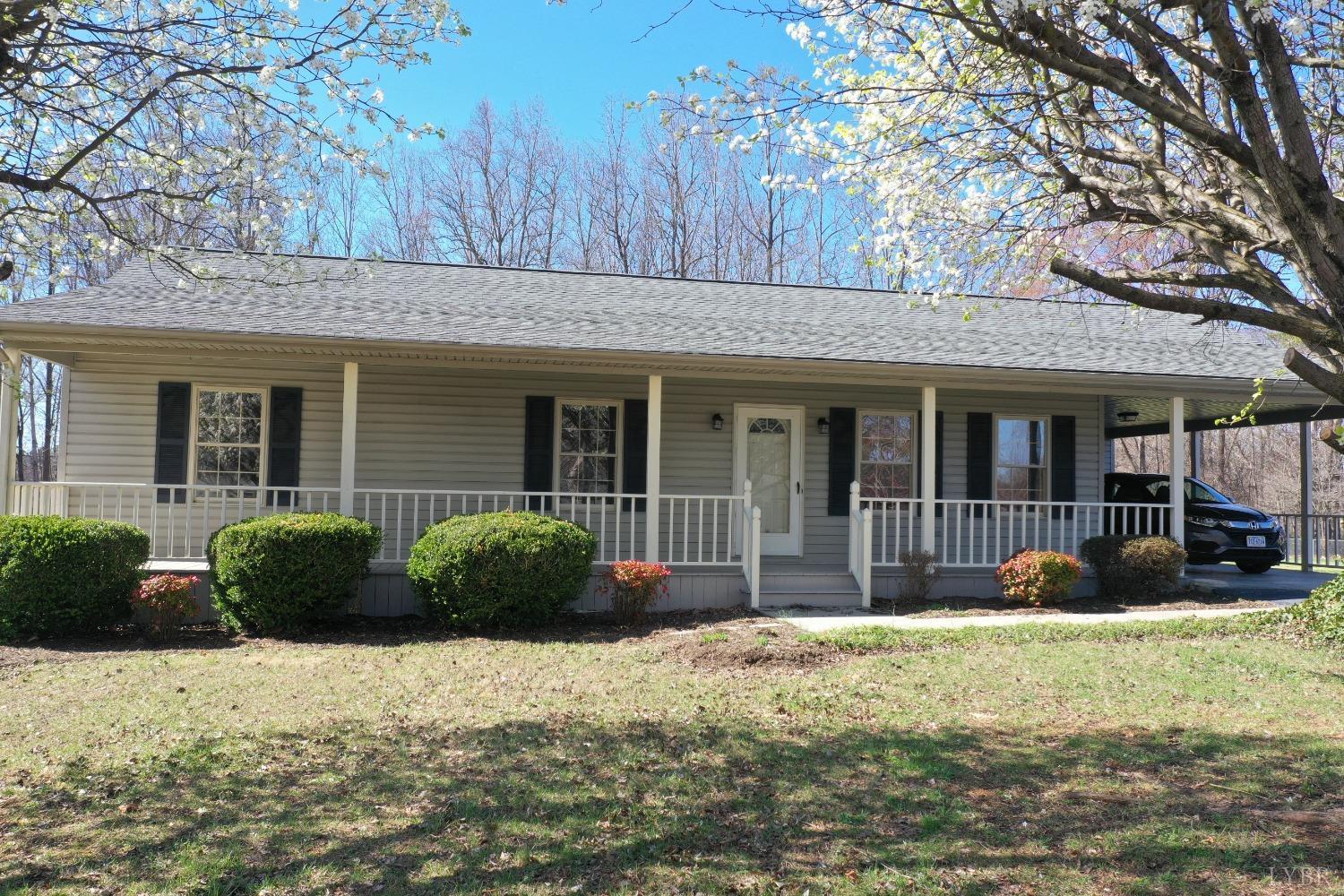 3328 Rocksprings Road Ringgold, VA 24586 - Photo 1 of 39 a front view of a house with a yard