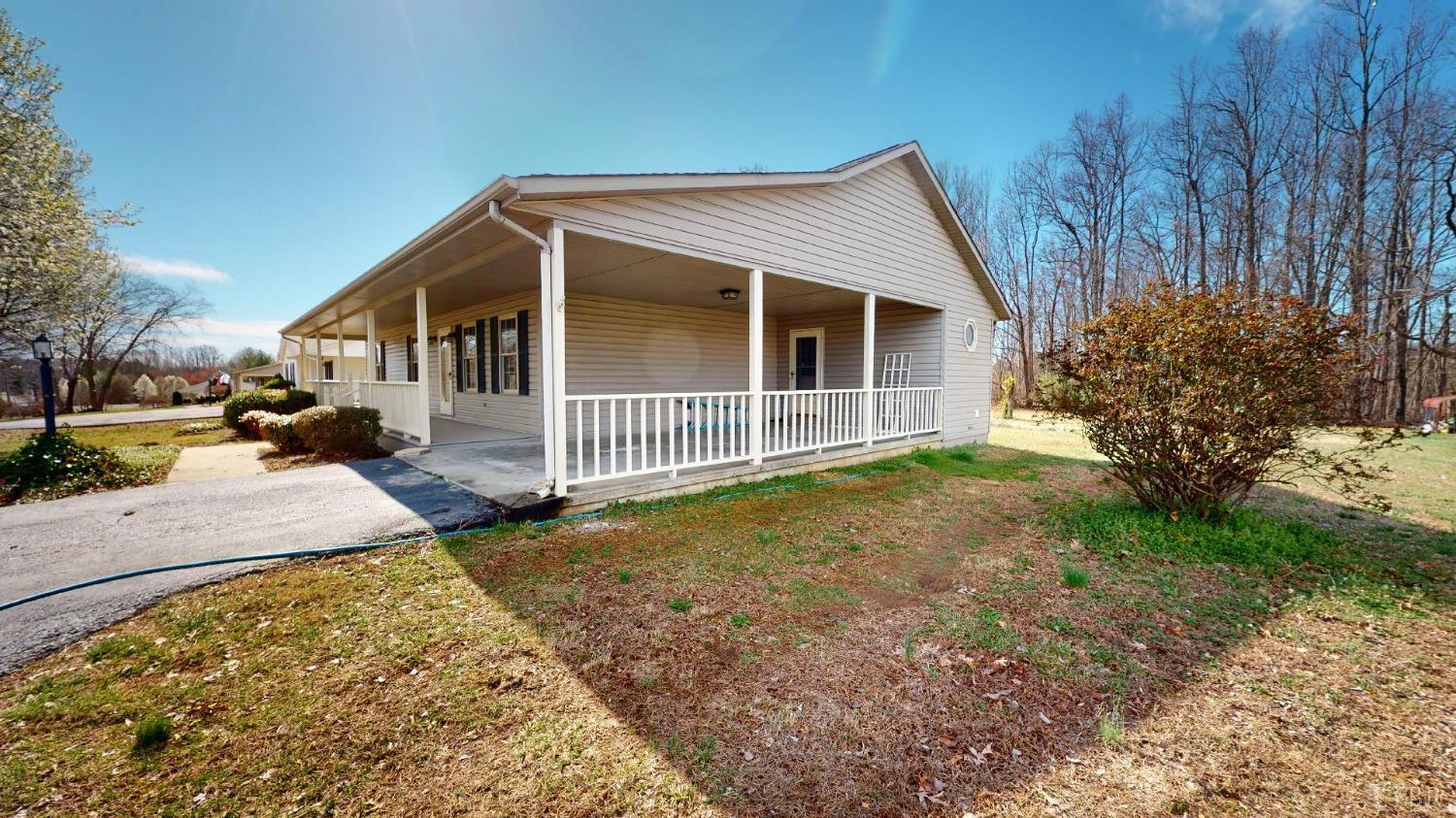 3328 Rocksprings Road Ringgold, VA 24586 - Photo 3 of 39 a view of a house with a yard and pathway