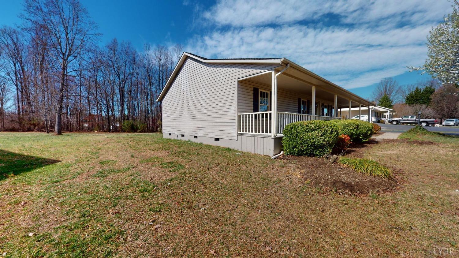 3328 Rocksprings Road Ringgold, VA 24586 - Photo 31 of 39 a view of a house with backyard and trees