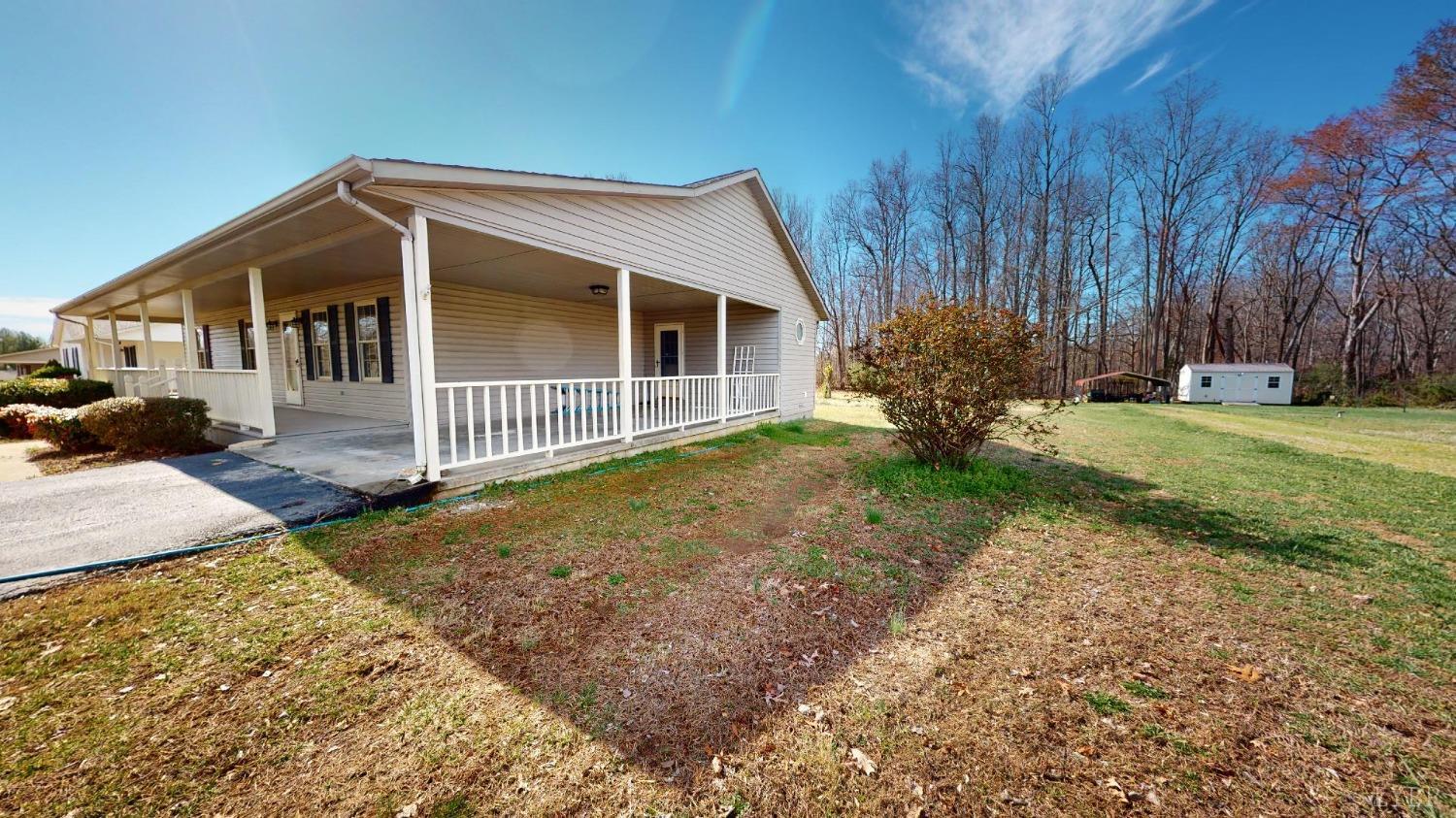 3328 Rocksprings Road Ringgold, VA 24586 - Photo 32 of 39 a front view of a house with garden