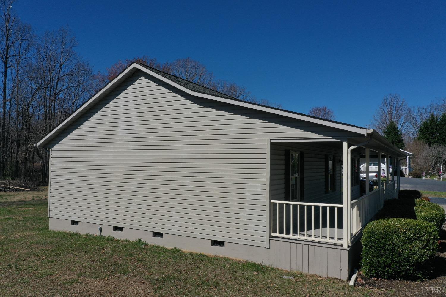 3328 Rocksprings Road Ringgold, VA 24586 - Photo 8 of 39 a view of a house with a yard