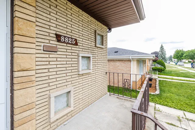 a view of a house with a white door
