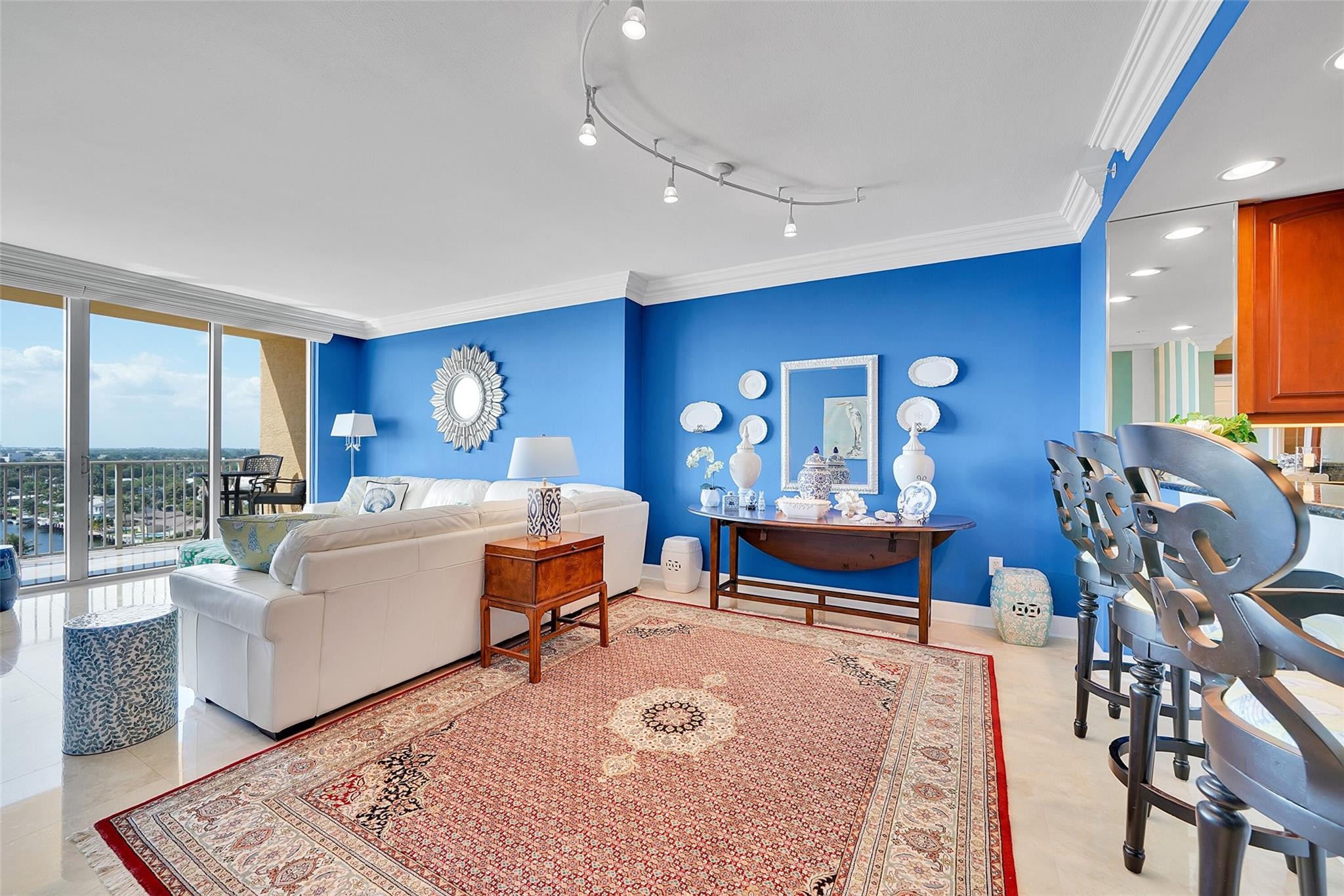821 North Riverside Drive, Unit PH2 Pompano Beach, FL 33062 - Photo 24 of 95 a bedroom with furniture and a rug