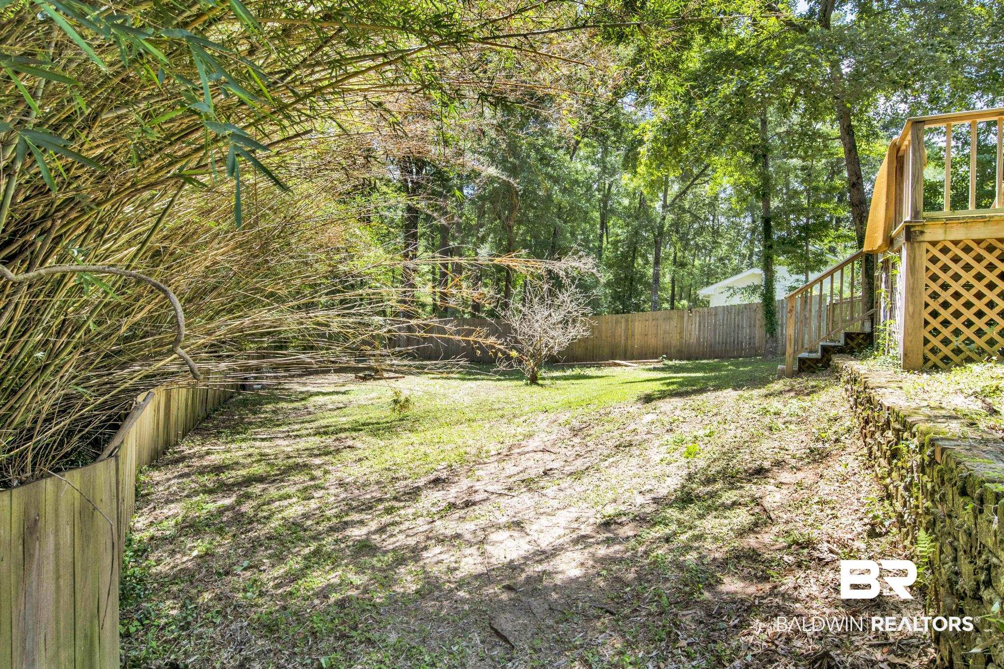 6805 Hunters Court Mobile, AL 36695 - Photo 37 of 37 Fenced backyard with stairs