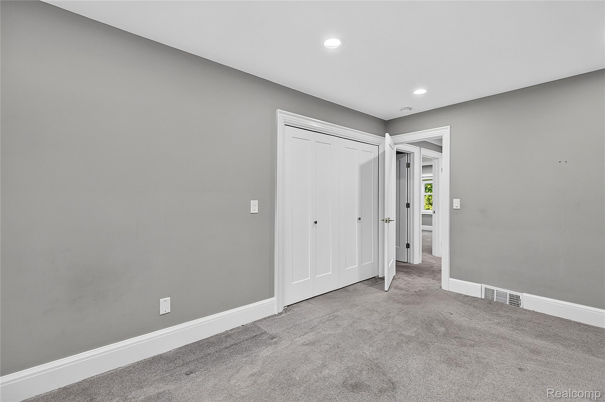 15879 Millar Road Clinton Township, MI 48036 - Photo 27 of 65 Recessed lighting, wall-to-wall carpeting, and a double-door closet