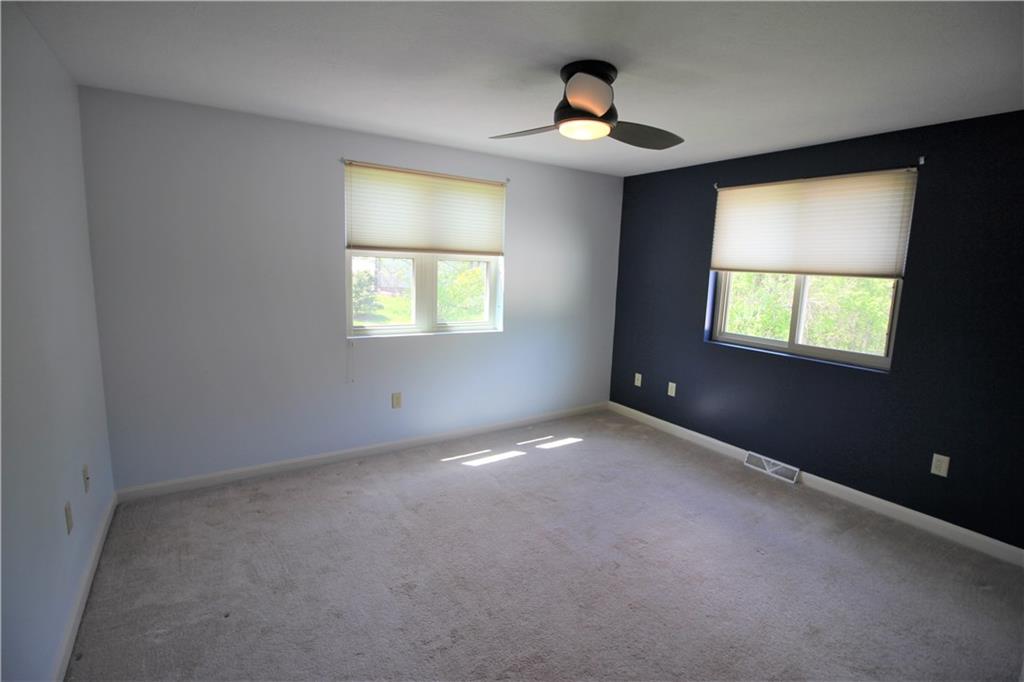 308 Georgetown Road Canonsburg, PA 15317 - Photo 14 of 24 Second Bedroom with ceiling fan and blinds ad double door closet