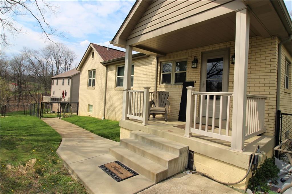 308 Georgetown Road Canonsburg, PA 15317 - Photo 22 of 24 A concrete sidewalk lead you to the covered back porch