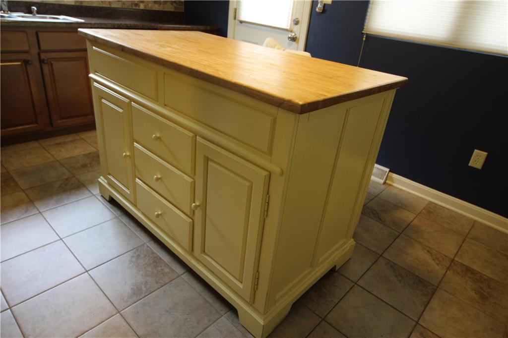 308 Georgetown Road Canonsburg, PA 15317 - Photo 9 of 24 A darling kitchen island to give you more cooking, dining storage space with 2 stools.