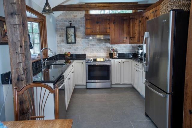 192 North Salem Road Ridgefield, CT 06877 - Photo 1 of 1 a kitchen with stainless steel appliances granite countertop a refrigerator a stove and a sink with wooden floor