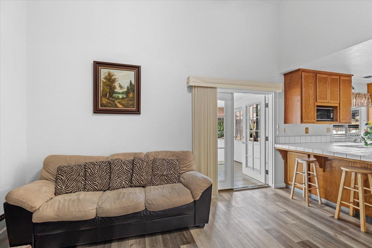 3005 Willetts Way Ceres, CA 95307 - Photo 11 of 29 a living room with furniture and a wooden floor