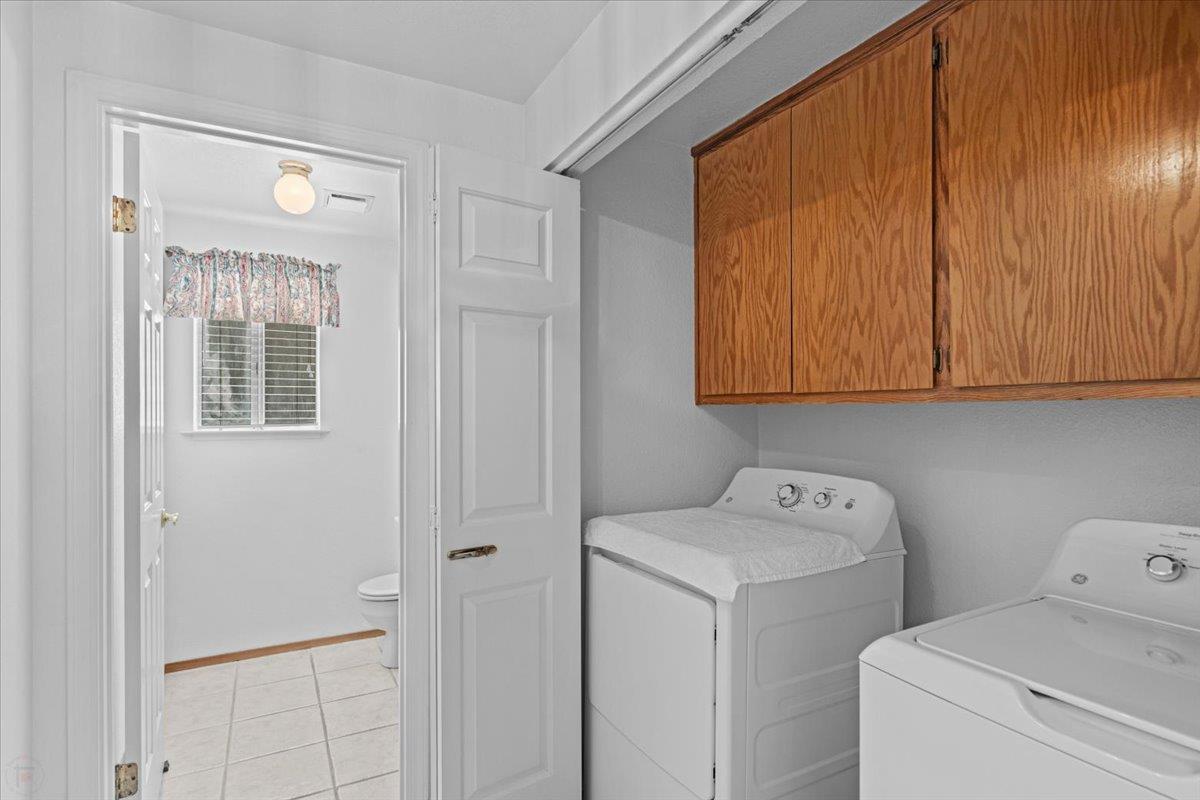3005 Willetts Way Ceres, CA 95307 - Photo 14 of 29 a view of storage and utility room with washer and dryer