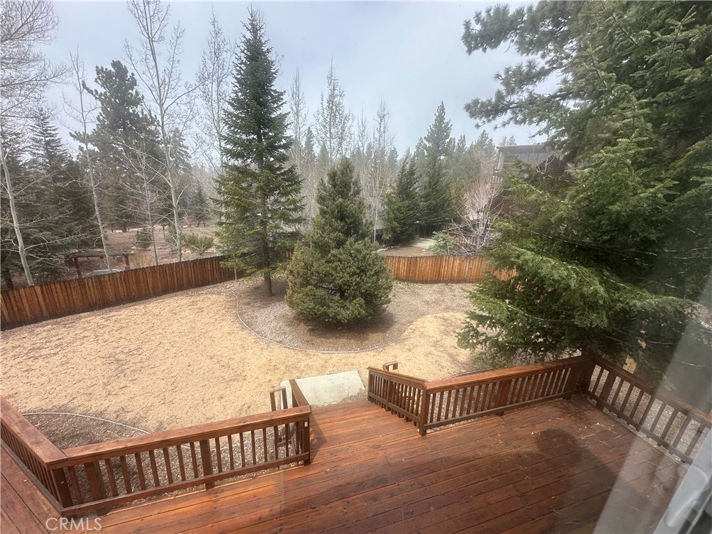 43632 Shasta Road Big Bear Lake, CA 92315 - Photo 23 of 30 a view of terrace with wooden floor and trees