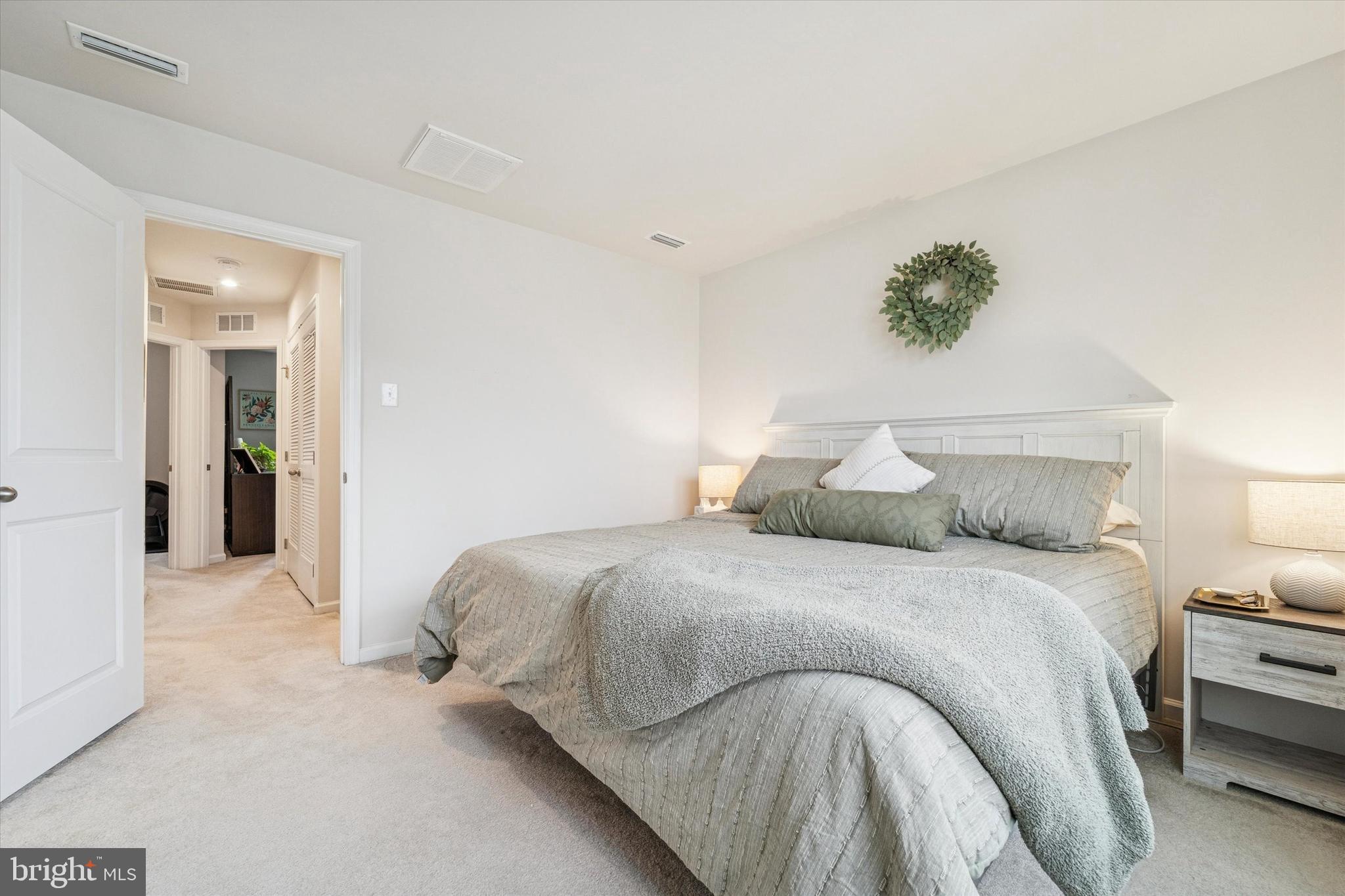 139 Nelson Lane Pottstown, PA 19464 - Photo 11 of 18 a bedroom with a bed and a painting