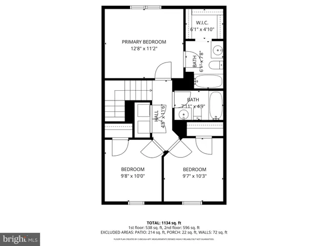 a picture of a bench in front of a wall