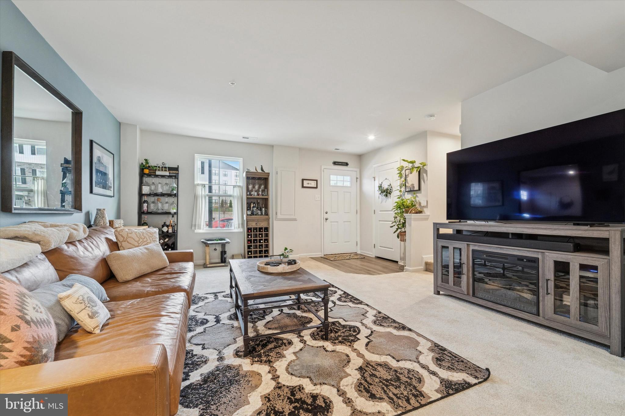 139 Nelson Lane Pottstown, PA 19464 - Photo 3 of 18 a living room with furniture and a flat screen tv