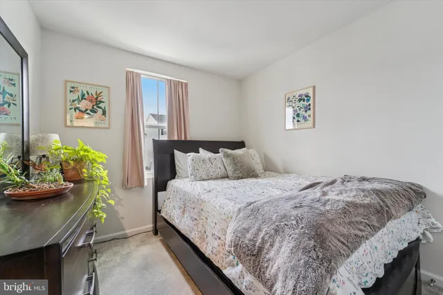 a bedroom with a bed and furniture