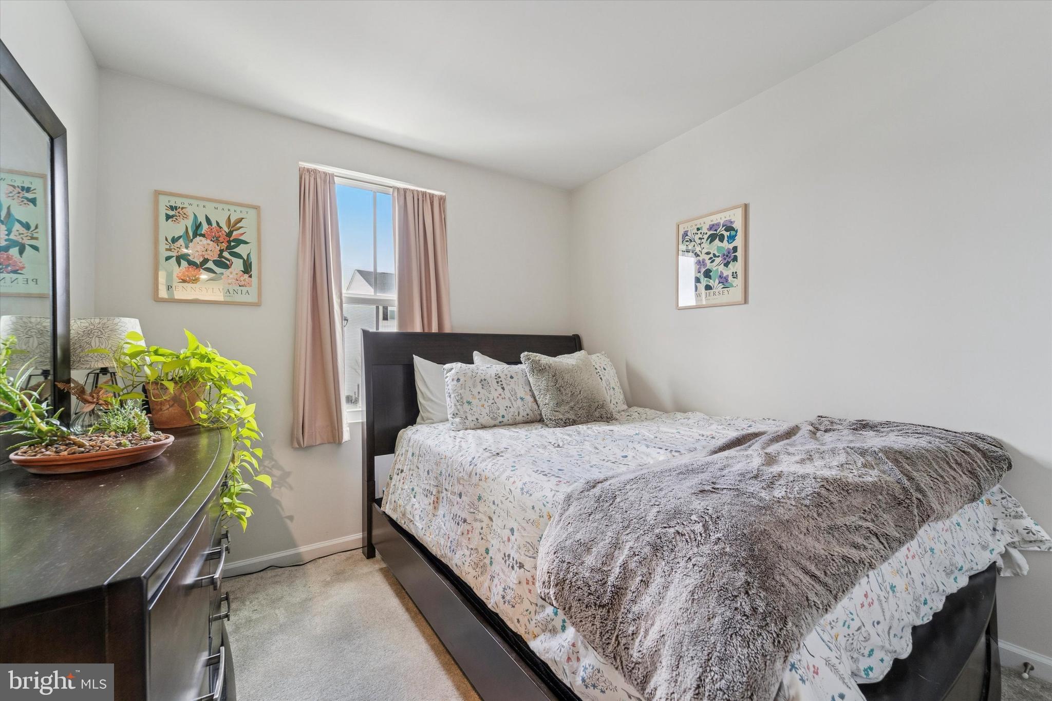 139 Nelson Lane Pottstown, PA 19464 - Photo 8 of 18 a bedroom with a bed and furniture