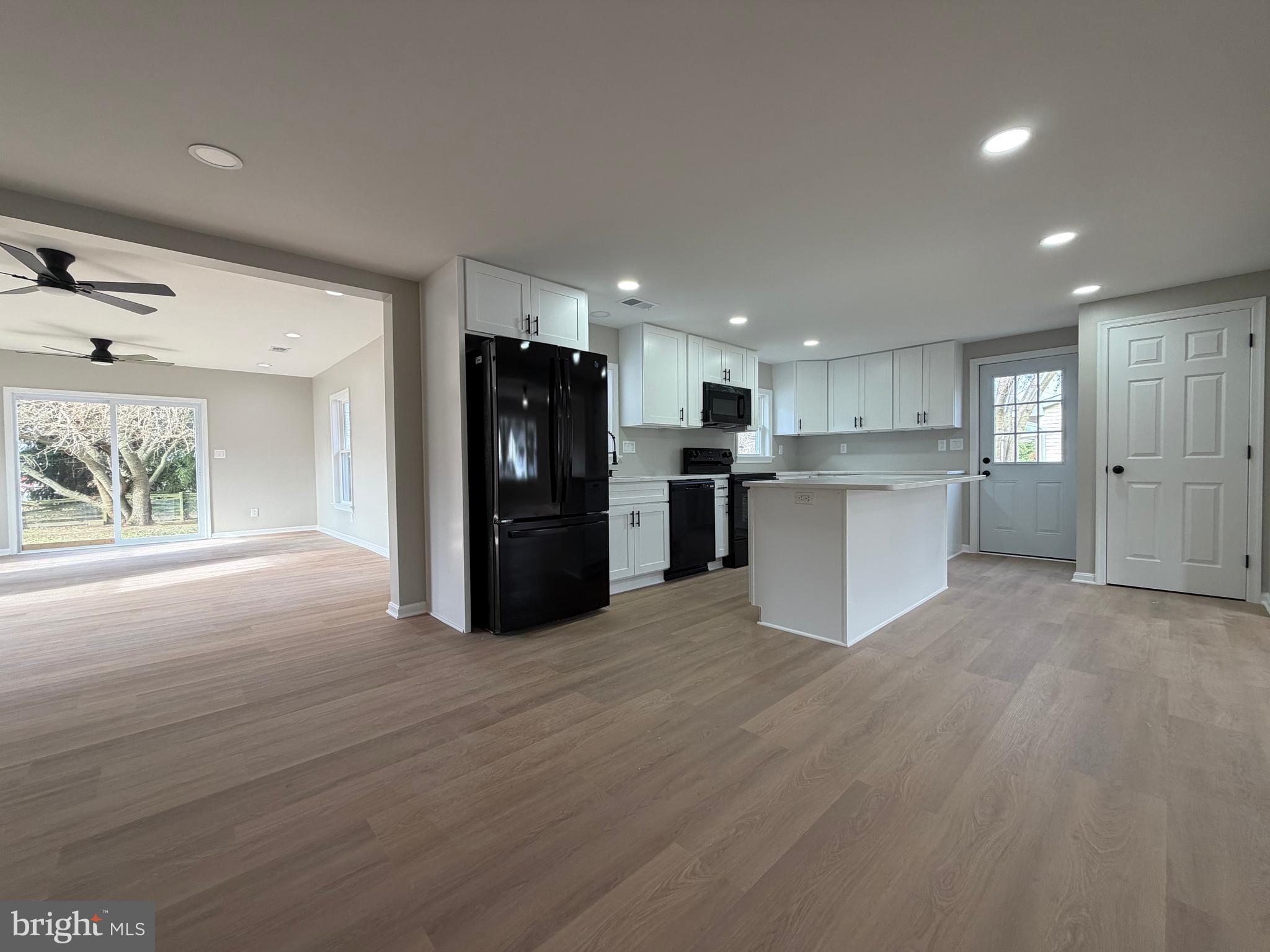 114 Birch Road Stevensville, MD 21666 - Photo 17 of 53 Kitchen, Dining, and Sunroom - Open Concept!